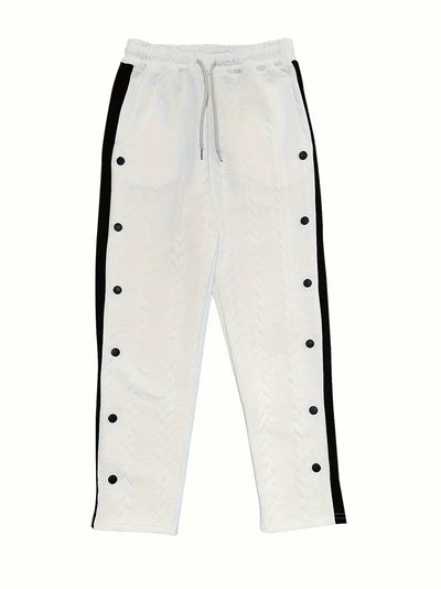 SILVESTRE - STICKADE BYXOR MED SIDOKNAPPAR